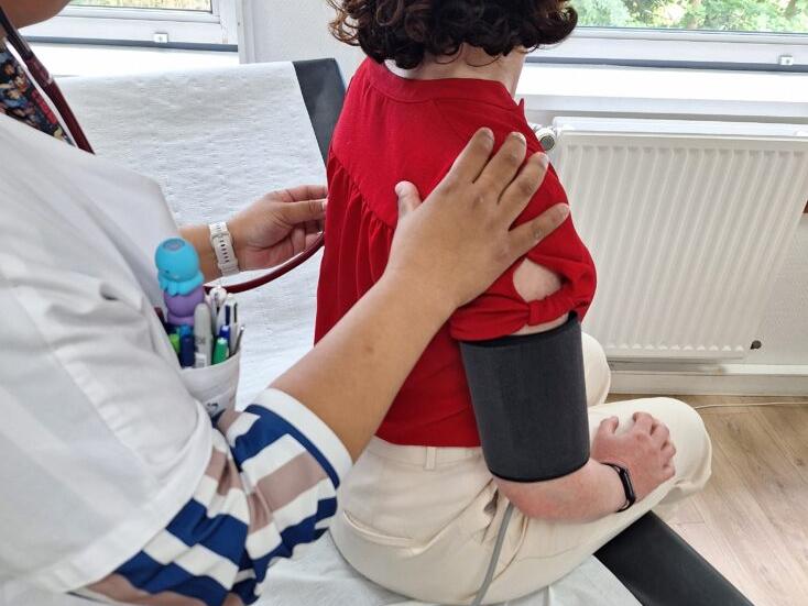 Infirmière Coordinatrice avec une patiente