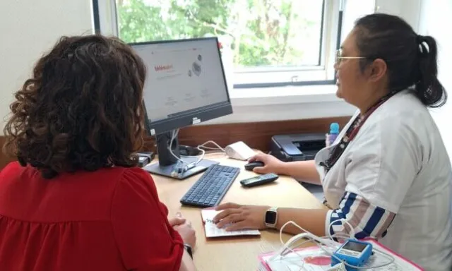 Infirmière Coordinatrice avec une patiente 2