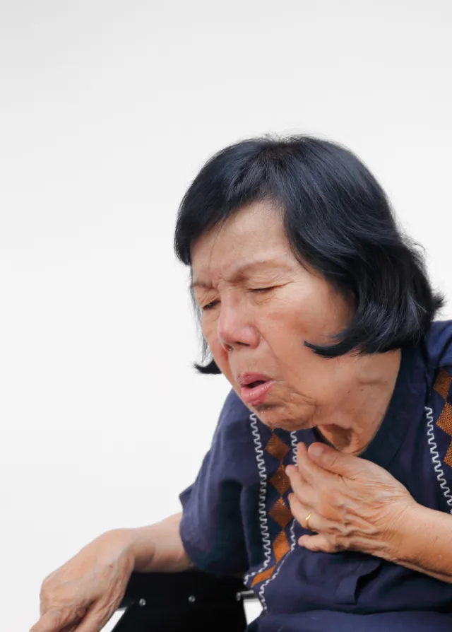 Patiente en train de tousser