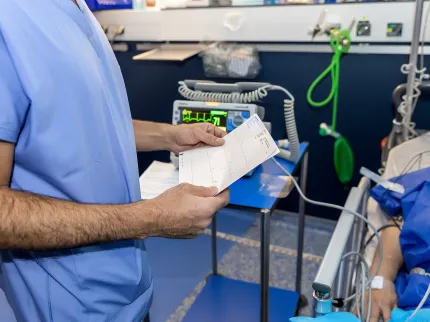 prise en charge d'un patient après intervention en salle de soins post-interventionnelle